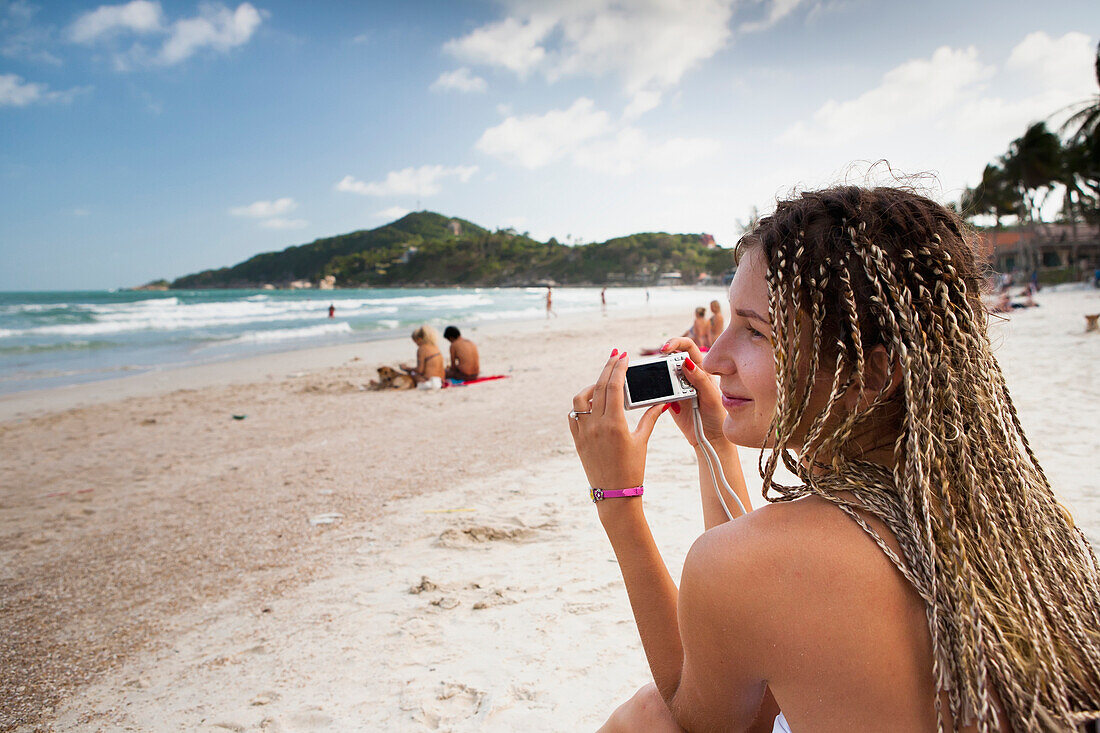 Russian girl poses on Haad Rin beach, Ko Phangan, Thailand