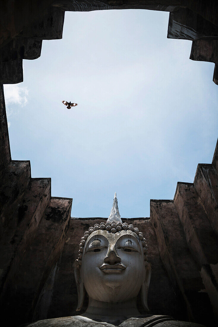 A giant enclosed Buddha in Sukhothai, central Thailand, Sukhothai, Thailand