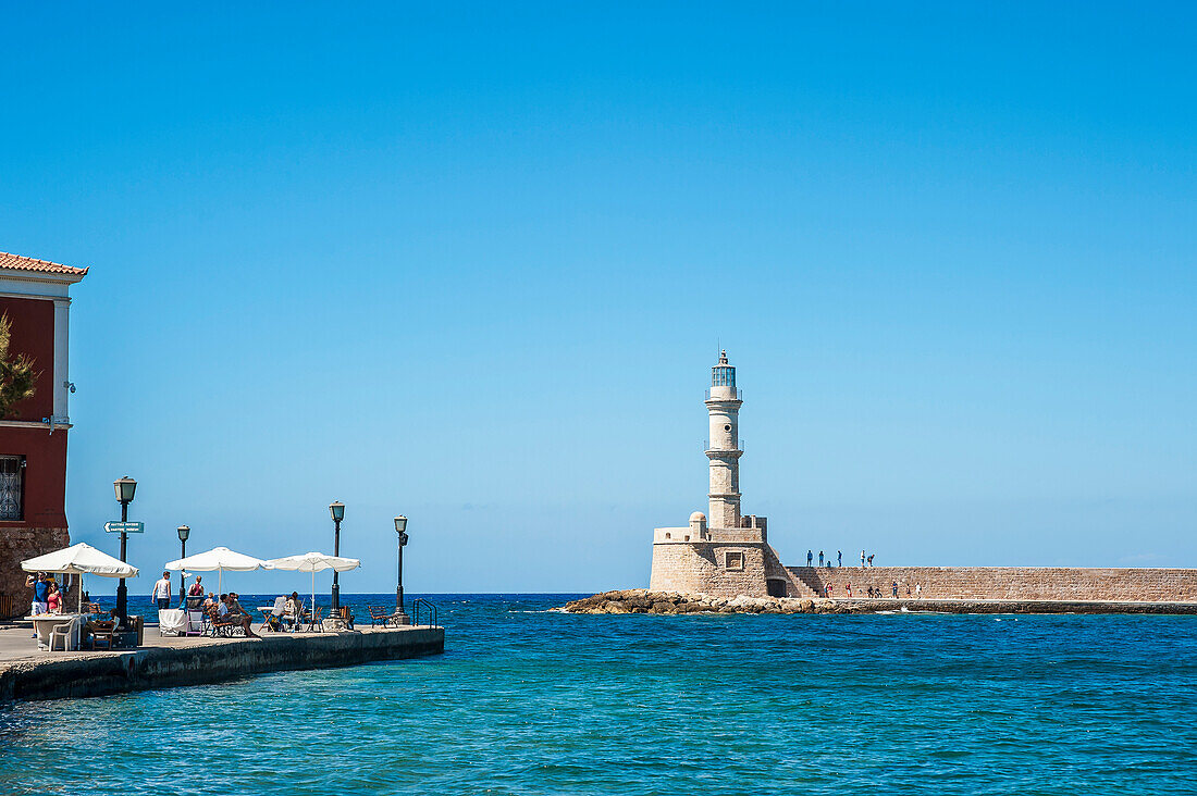 Lighthouse in the Venetian harbour, Chania, Crete, Greece