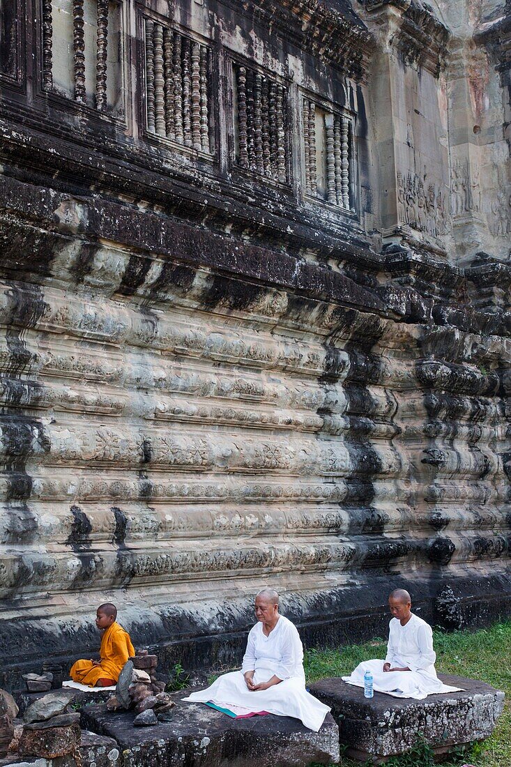 Cambodia,Siem Reap,Angkor Wat,Nuns and Monk Meditating
