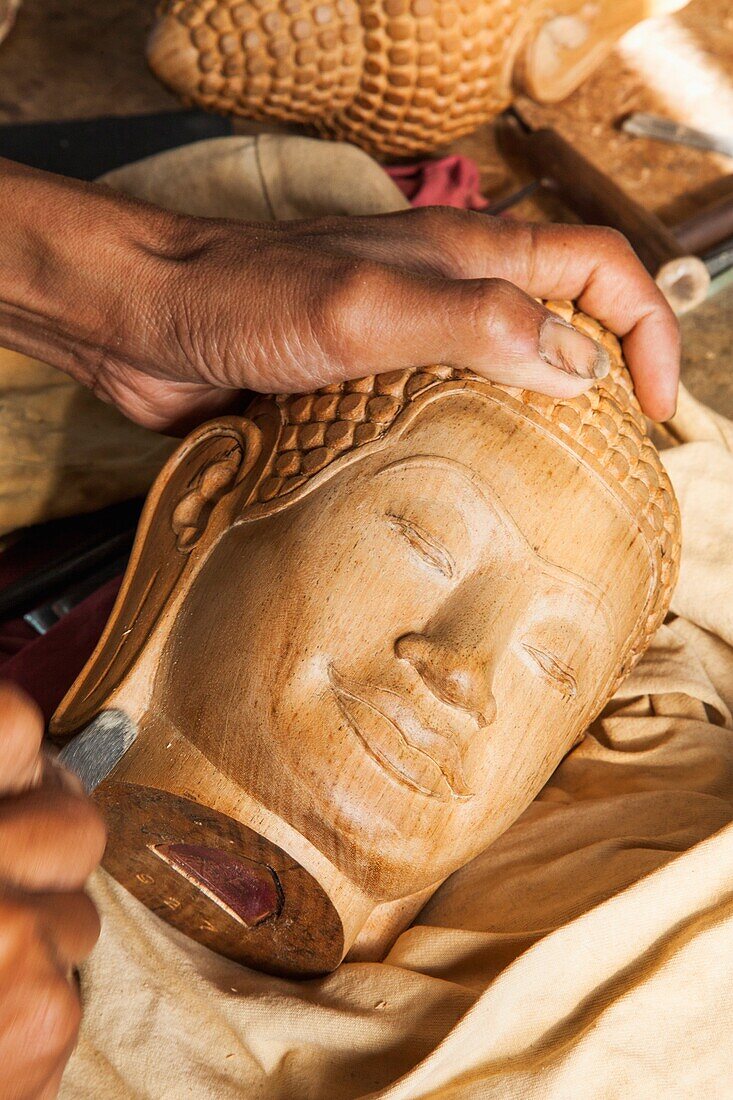 Cambodia,Siem Reap,Artisans Angkor Workshop,Carving Buddha Head