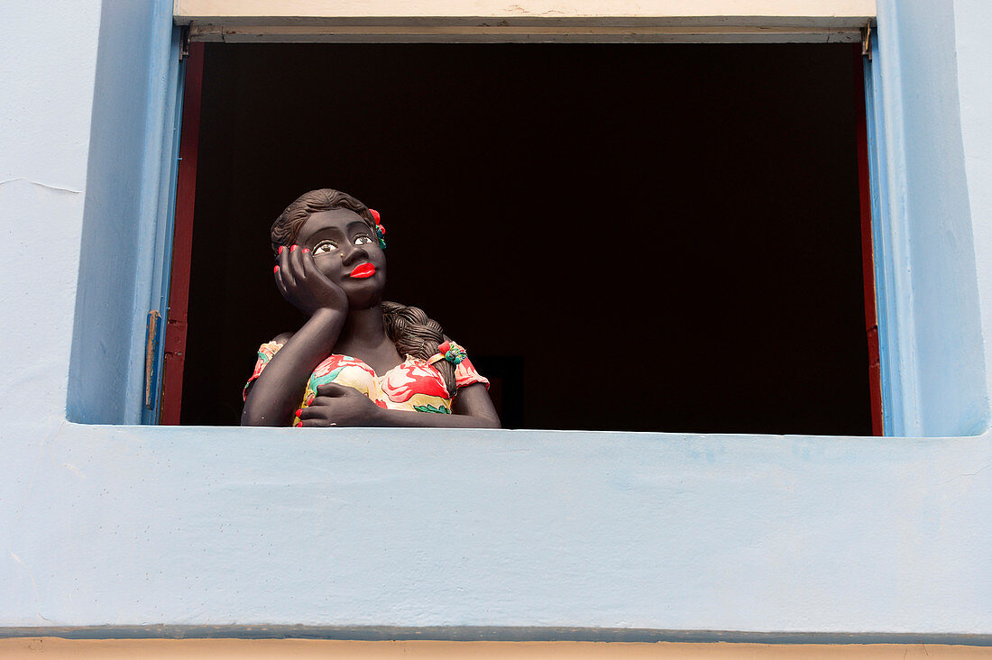 Woman statue at window in Ouro Preto, Minas Gerais , Brazil, South America