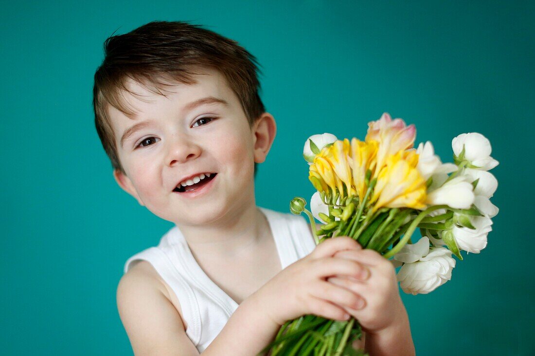 Little boy with flowers