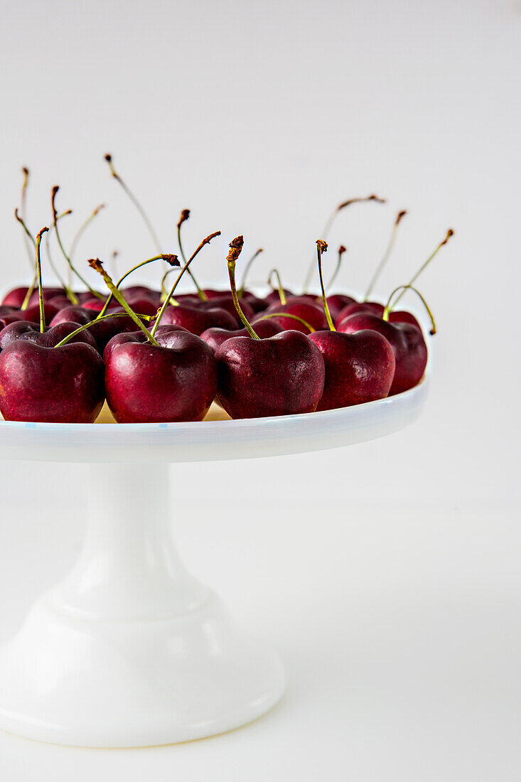 Cherries on a Cake Plate, Close-Up