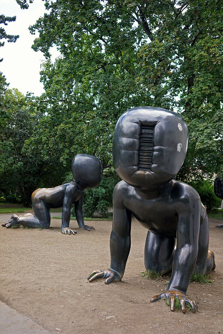 giant babies, modern works by david cerny in kampa park on the banks of the vltava river, prague, bohemia, czech republic