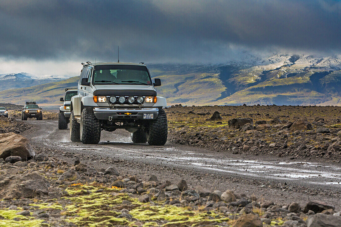 jeep on route 155 called the kaldidalursvegur from the kaldidalur (the cold valley), a desert of pebbles and rocks along the porisjokull and langjokull glaciers, iceland, europe