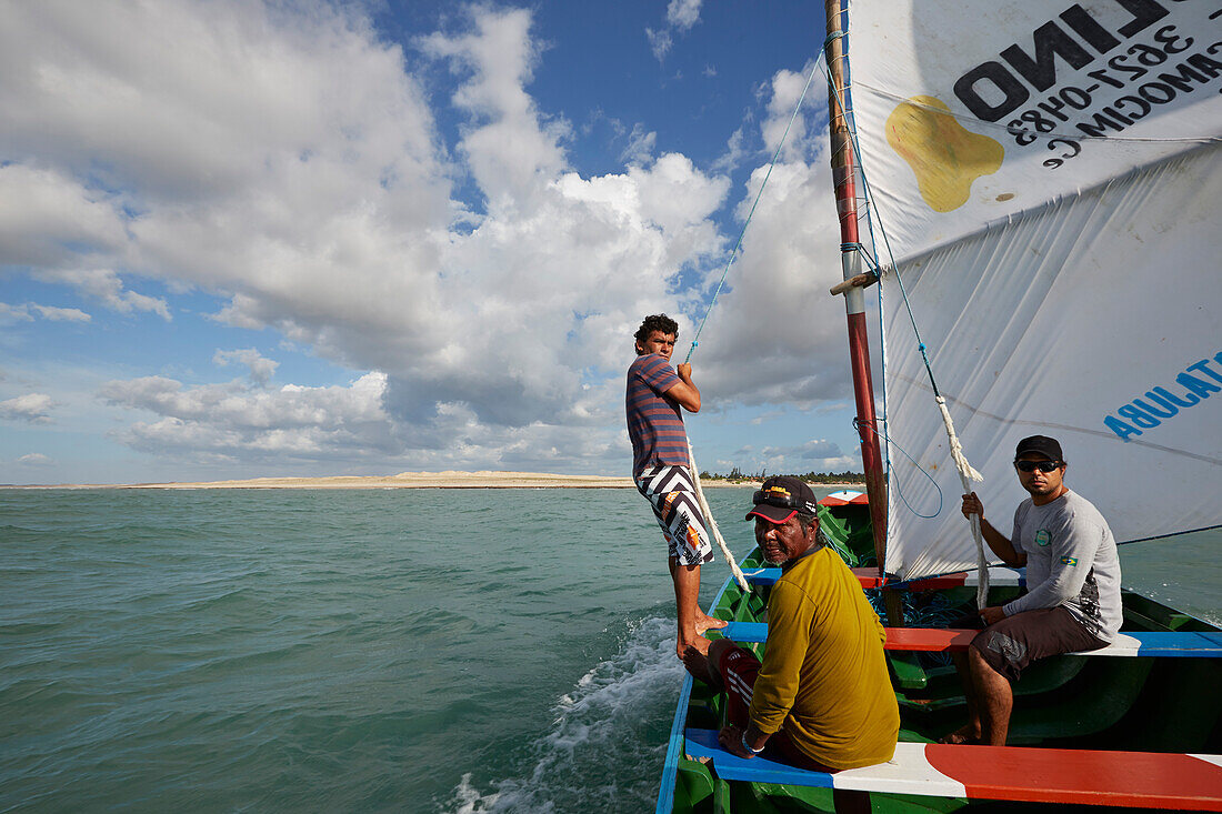 Sailing with fishing boat (Canoa) near the fishing village of Maceio, west Camocim, west Jericoacoara, Ceara, Brazil