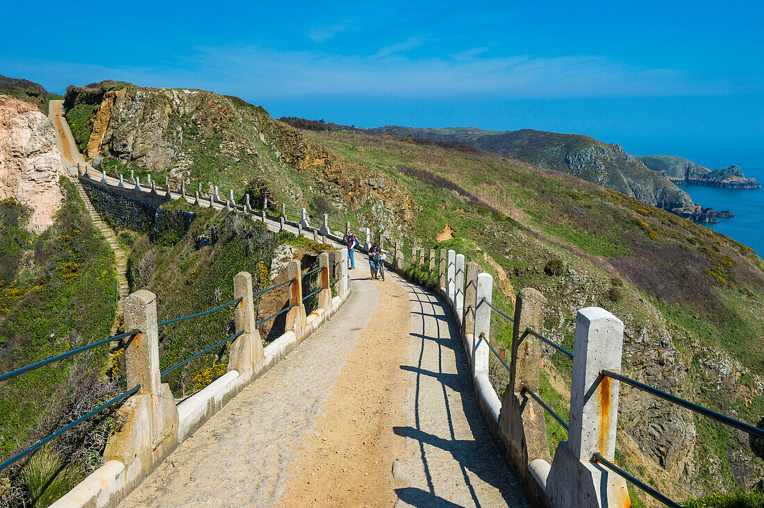 Road connecting the narrow isthmus of Greater and Little Sark, Channel Islands, United Kingdom, Europe