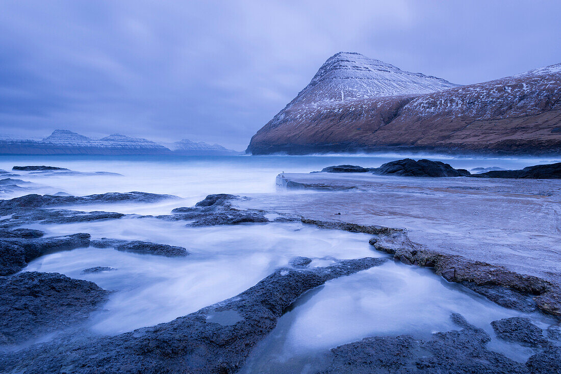 Dramatic coastline of Gjogv in winter on the island of Eysturoy, Faroe Islands, Denmark, Europe
