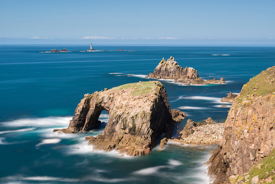 Enys Dodnan, the Armed Knight and Longships Lighthouse, off the coast of Land's End, Cornwall, England, United Kingdom, Europe