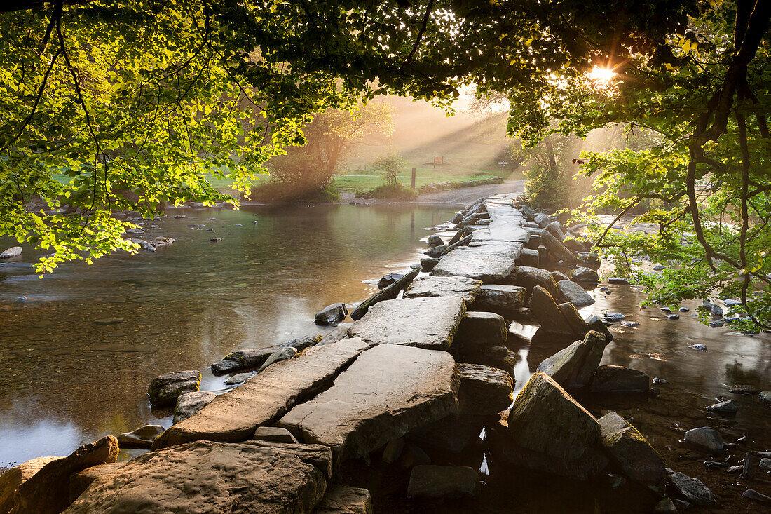 Tarr Steps clapper bridge crossing the River Barle, Exmoor National Park, Somerset, England, United Kingdom, Europe