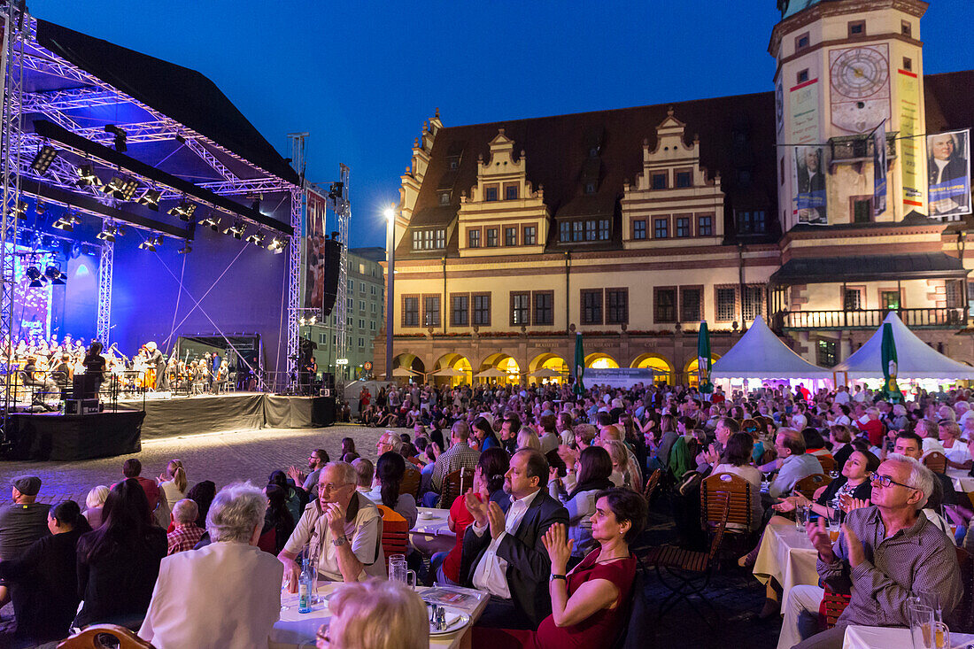 Audience at the open air concert in the evening, German Chinese choir and orchestra at the Bachfest Leipzig 2015, Bach Academy, town hall, market place, Leipzig, Saxony, Germany