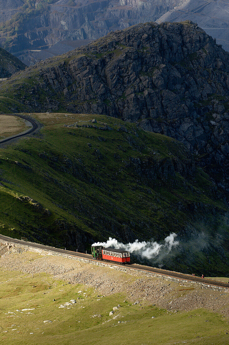 Steam train on route between Llanberis and the summit of Mount Snowdon in Snowdonia National Park, Gwynedd, Wales, United Kingdom, Europe