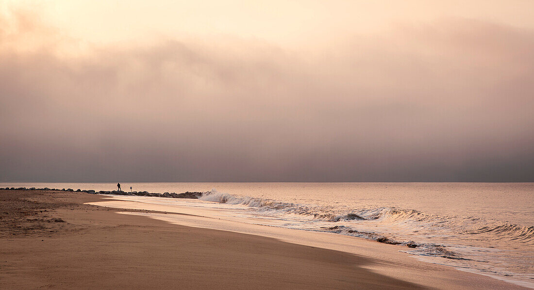 Early morning fisherman on Will Rogers Beach, Pacific Palisades, California, United States of America, North America