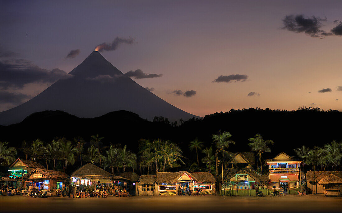 Bars and restaurants with Mayon Volcano, crater glow, Legazpi City, Philippines, Asia