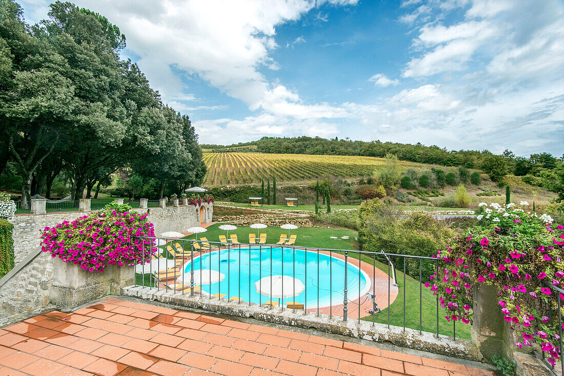Swimming pool on hotel grounds, Radda in Chianti, Siena, Italy