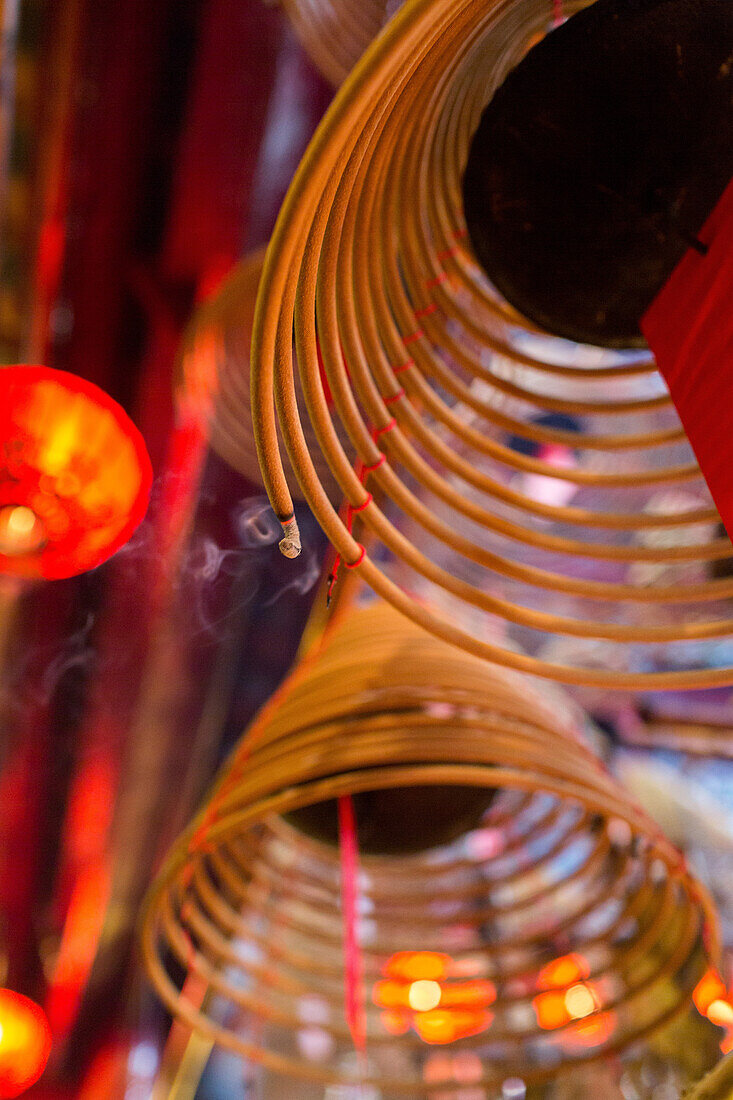 historic Man Mo temple, spiral incense coils, red, from below, graphic, traditional, religion, historic, detail, Hong Kong, China, Asia
