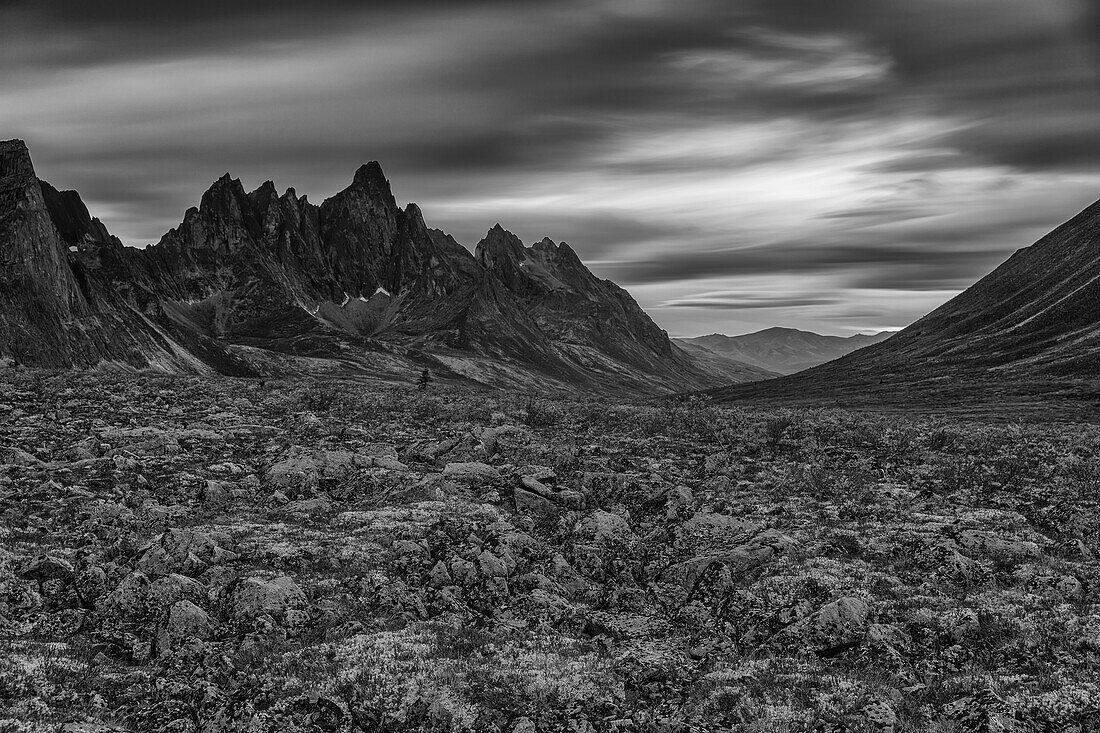 Black and white image of the Tombstone Valley in Tombstone Territorial Park, Tombstone Mountain in the distance, Yukon, Canada