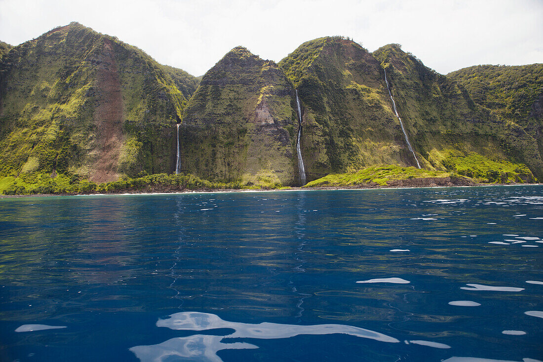 Waterfall into ocean, Hamakua Coast, Island of Hawaii, Hawaii, United States of America