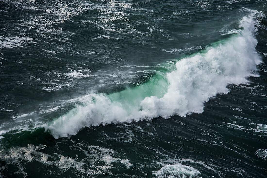 A wave breaks at Cape Falcon, Manzanita, Oregon, United States of America