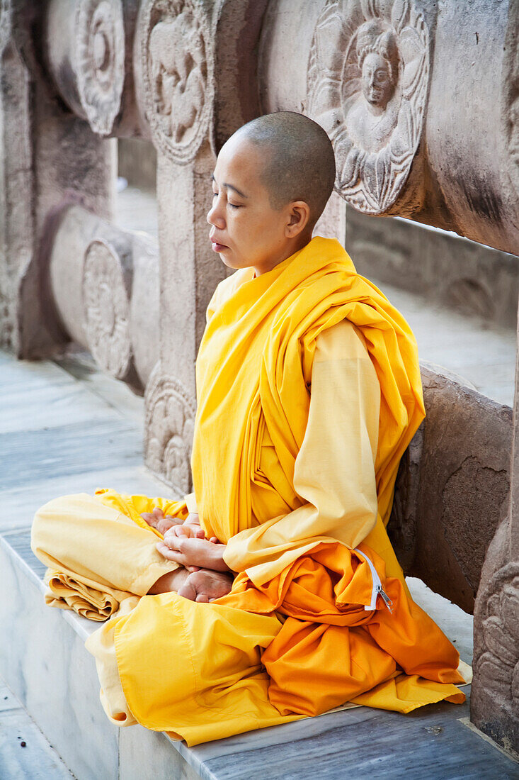 Buddhist Nun Meditating, Mahabodi Temple, Bodhgaya, Bihar, India