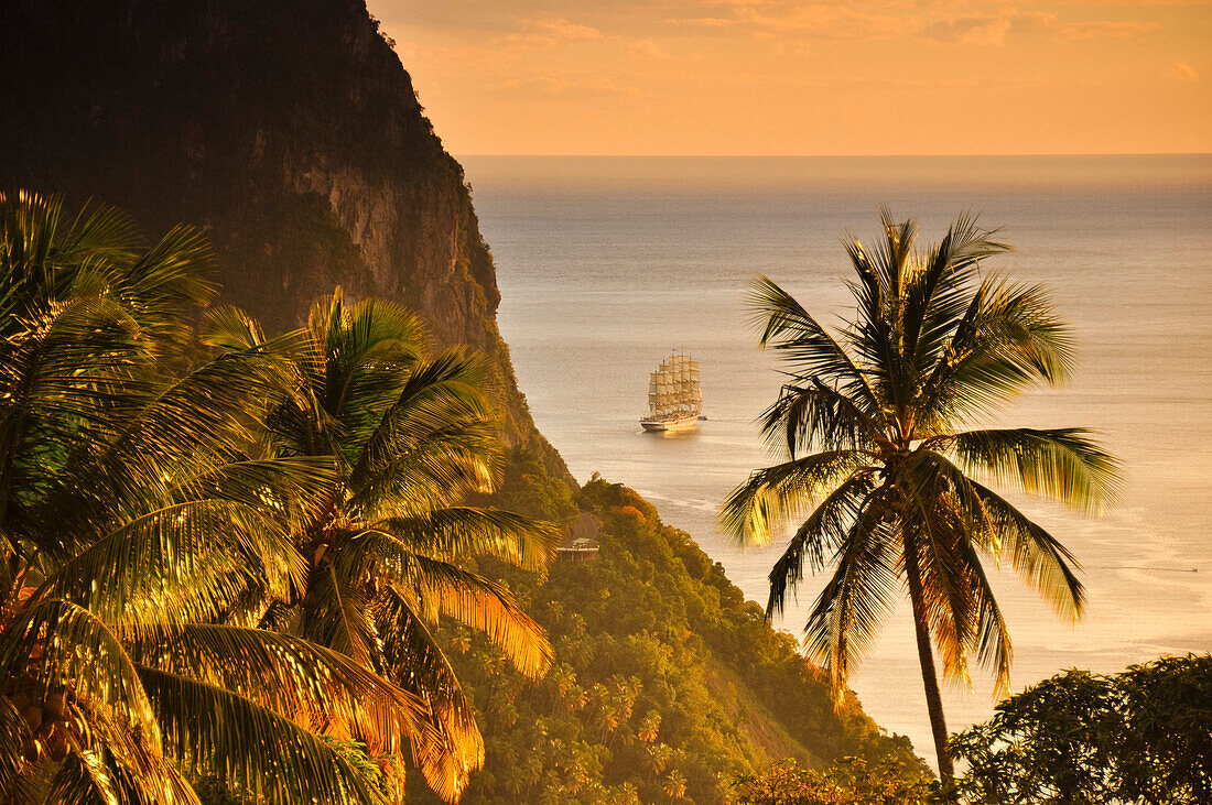 sunset with sea view, sailing ship and volcano mountains The Pitons, Gros Piton, Pitons Bay, UNESCO world heritage, Soufriere, St. Lucia, Saint Lucia, Lesser Antilles, West Indies, Windward Islands, Antilles, Caribbean, Central America
