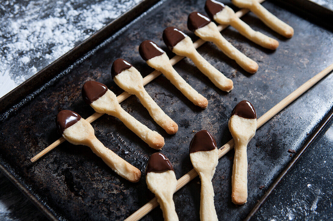 Two Rows of Cookie Spoons Dipped in Chocolate