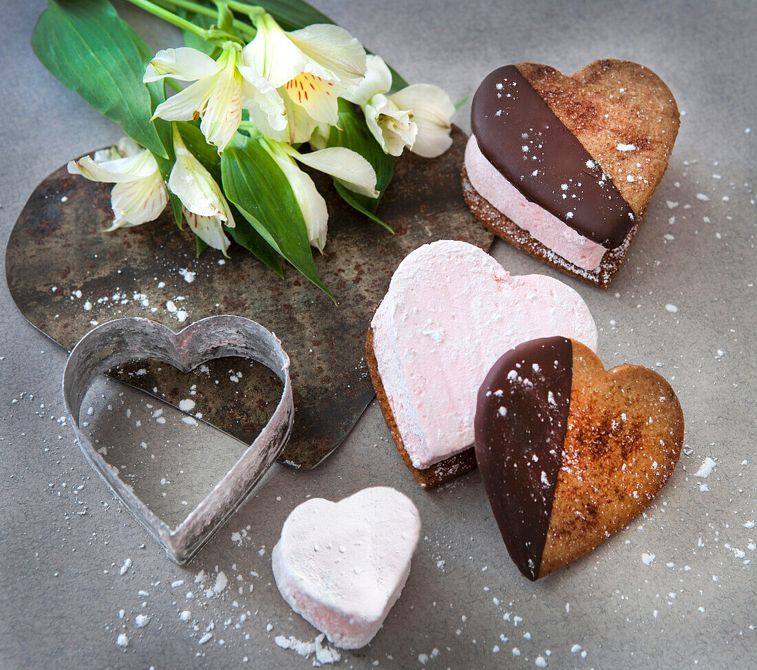 Heart-Shaped Cookies Dipped in Chocolate with Pink Marshmallow Filling