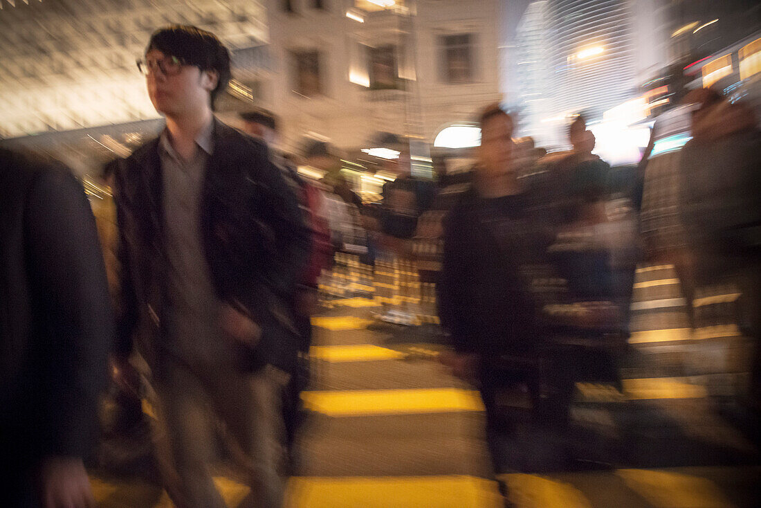 people crossing traffic lights at Peninsula Hotel, Kowloon, Hongkong, China, Asia