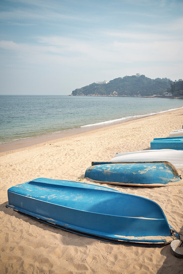 boats lay upside down at bay of Tung Wan Beach, Cheng Chau Island, Hongkong, China, Asia