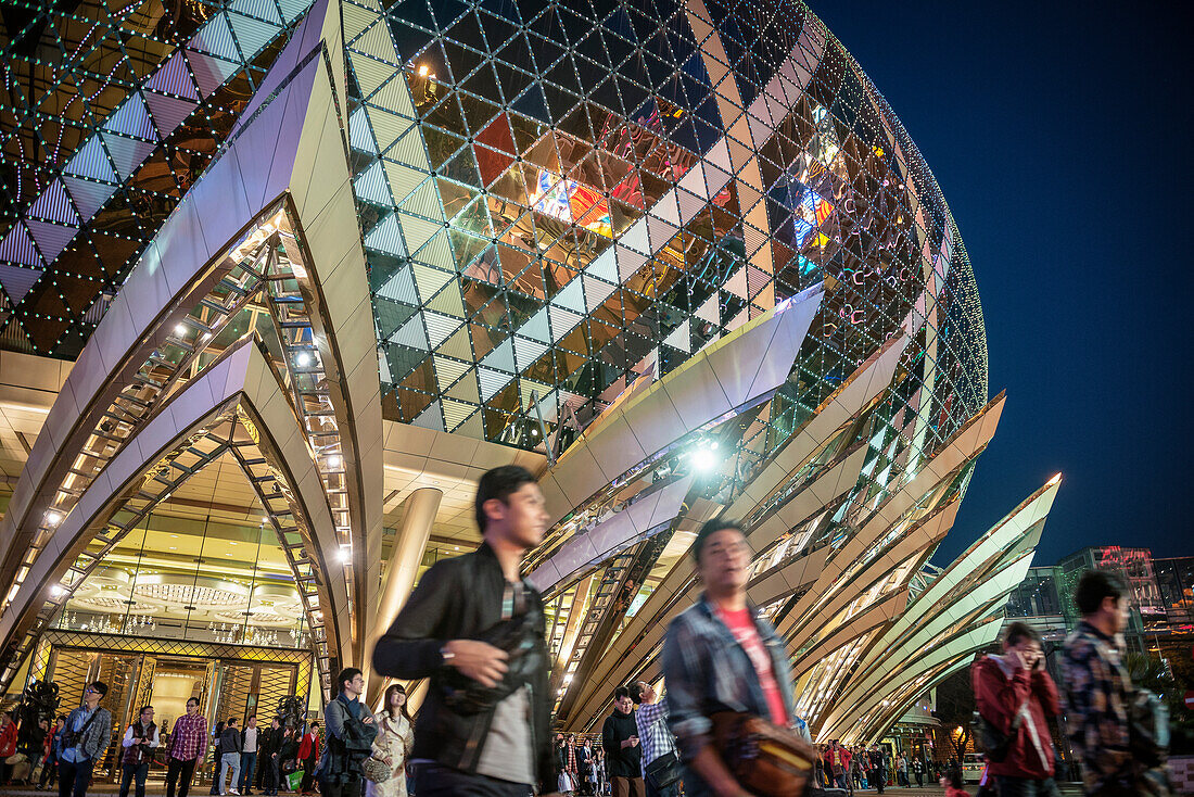 crowd of people in front of Grand Lisboa Casino at night, Macao, China, Asia