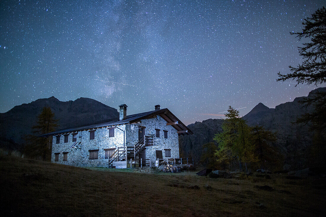 Starry night on Barbustel Refuge, Natural Park of Mont Avic, Aosta Valley, Graian Alps, Italy, Europe