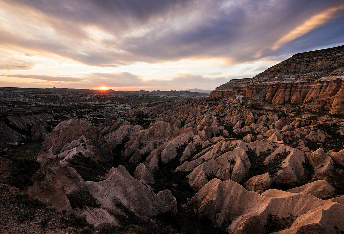 View from Aktepe Hill at sunset over Red Valley, Goreme National Park, UNESCO World Heritage Site, Cappadocia, Anatolia, Turkey, Asia Minor, Eurasia