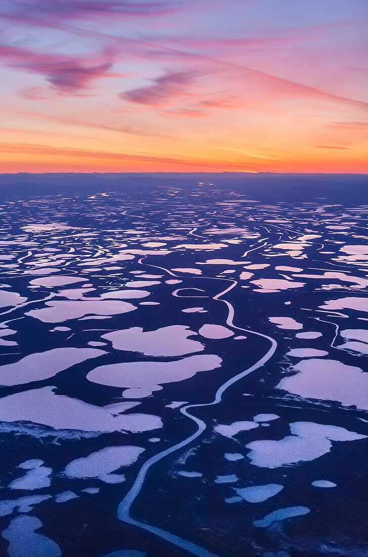 Aerial view of sunset over the wetlands of the Selawik National Wildlife Refuge, Kotzebue, Arctic Alaska, USA, Fall