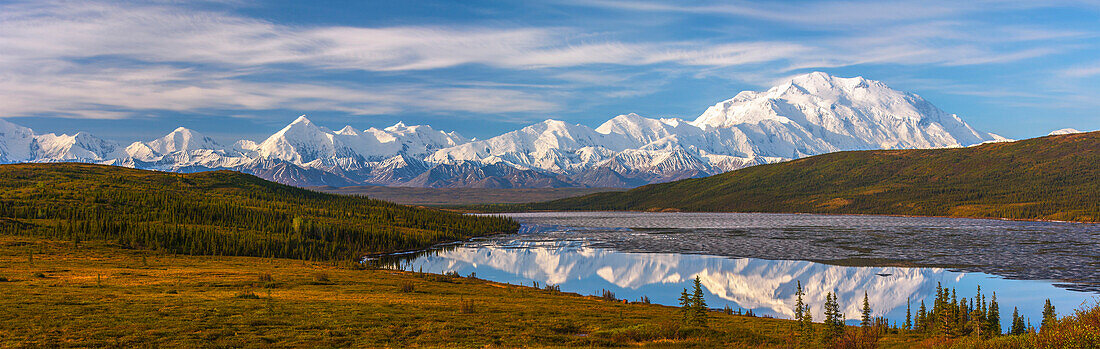 Panoramic autumn view of Mt. McKinley and Wonder Lake at sunrise, Denali National Park, Interior Alaska