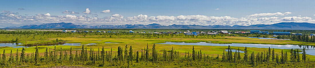 Panoramic view of the village of Noatak, surrounding wetlands and the Baird Mountains in the background, Arctic Alaska, summer