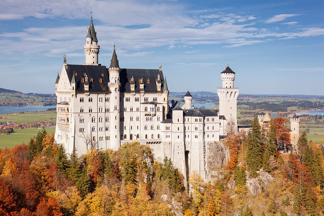 View of the castle Neuschwanstein from Marienbruecke in Autumn, Upper Allgaeu, Bavaria, Germany