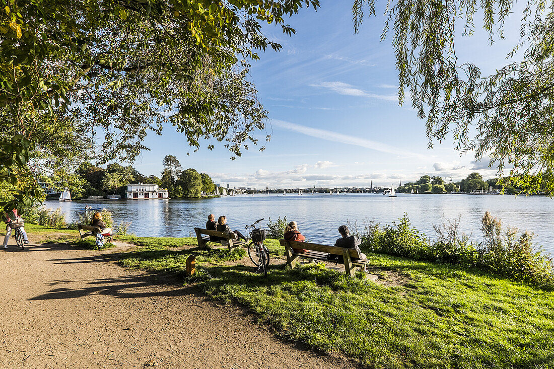 people enjoying the view and the sun at the Outer Alster, Hamburg, north Germany, Germany