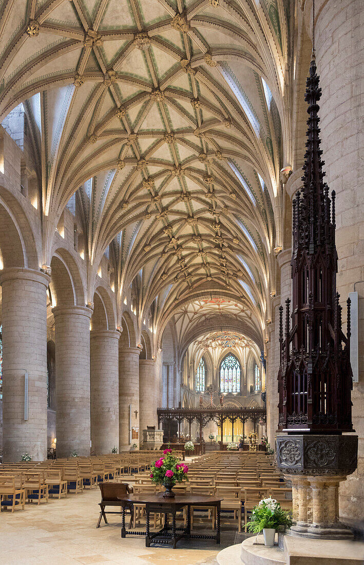 Interior looking East and font, Tewkesbury Abbey, Gloucestershire, England, United Kingdom, Europe
