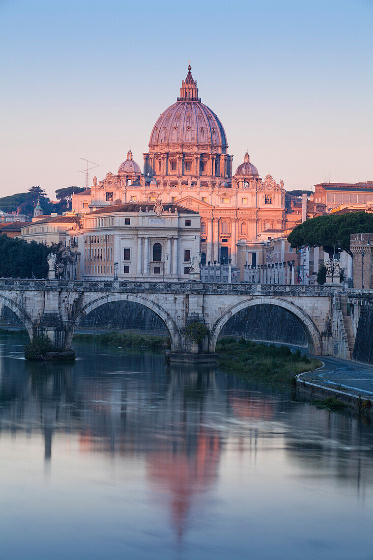 View of St. Angelo bridge over the River Tiber, and St. Peter's Basilica, Rome, Lazio, Italy, Europe
