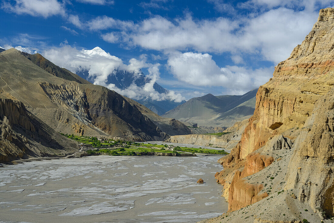 Tangbe, village with a buddhist Gompa in the Kali Gandaki valley, the deepest valley in the world. Nilgiri Himal (7061 m) in the background, Mustang, Nepal, Asia