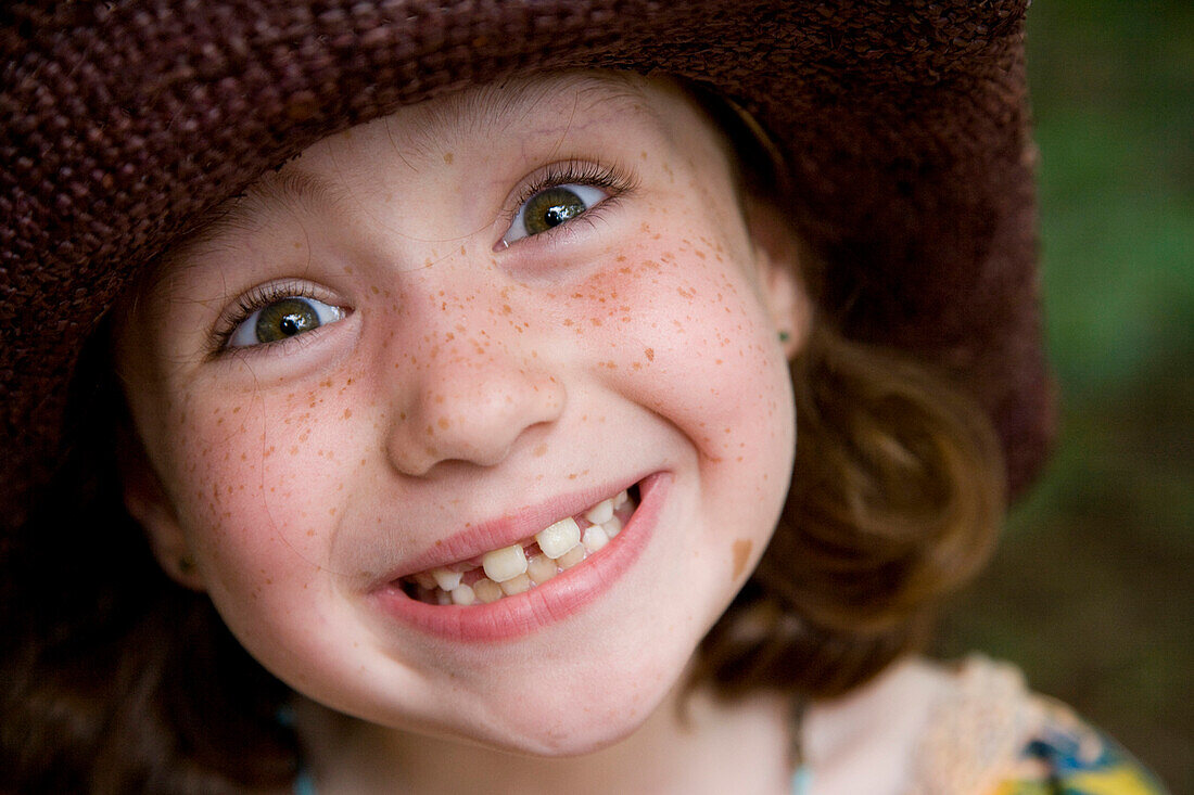 Close up of smiling Caucasian girl