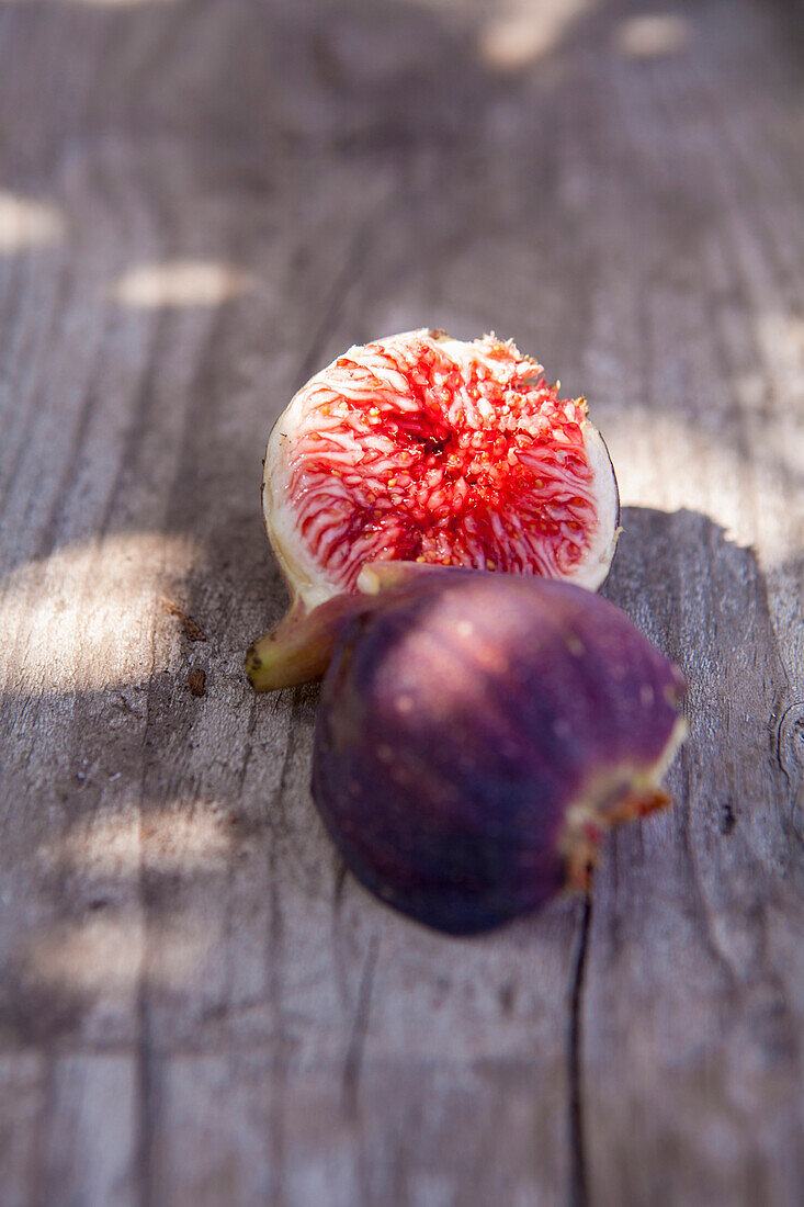 Close up of fresh sliced fig on board