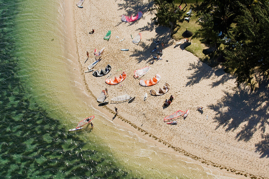 Aerial view of kitesurfers on beach