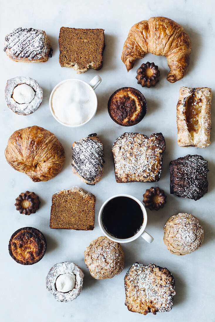 High angle view of variety of pastries and coffee