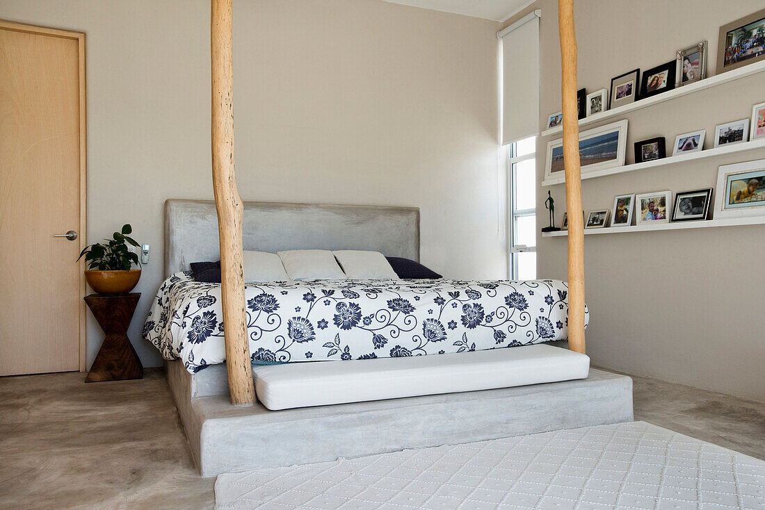 Bed and bedposts in modern bedroom