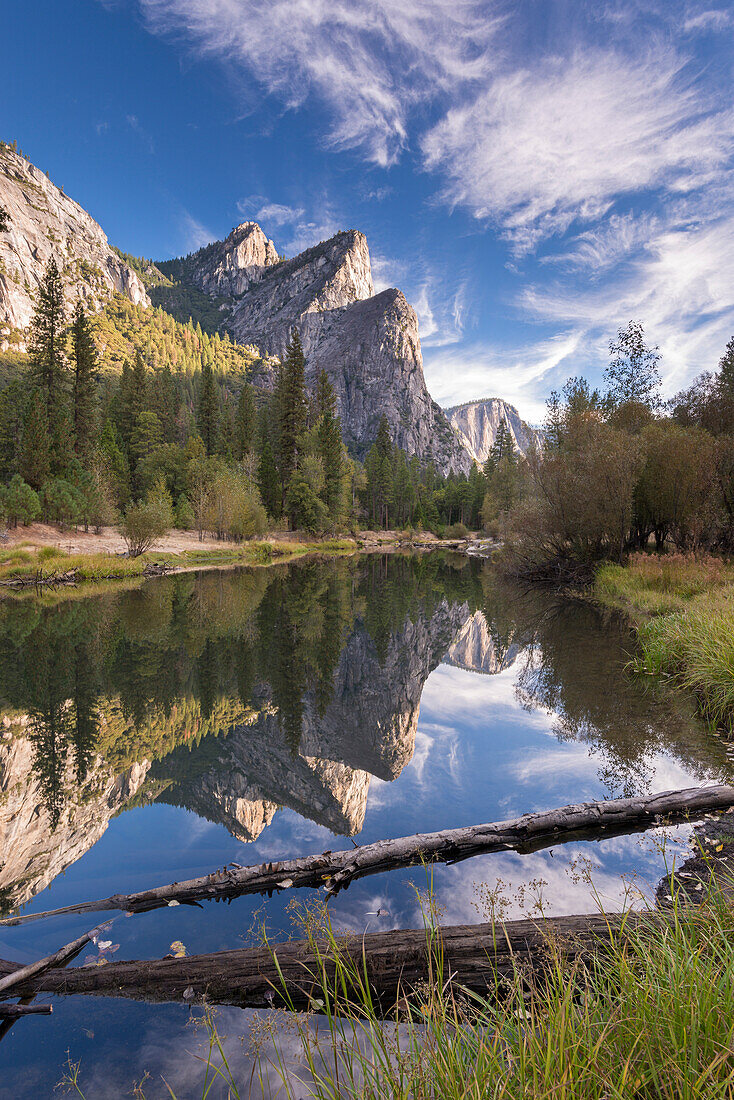 The Three Brothers reflected in the Merced River in Yosemite Valley, Yosemite National Park, UNESCO World Heritage Site, California, United States of America, North America