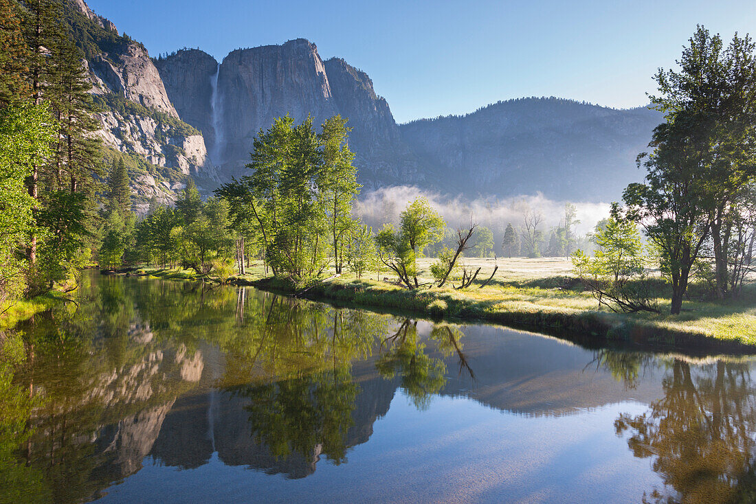 Yosemite Falls and the Merced River at dawn on a misty Spring morning, Yosemite Valley, UNESCO World Heritage Site, California, United States of America, North America