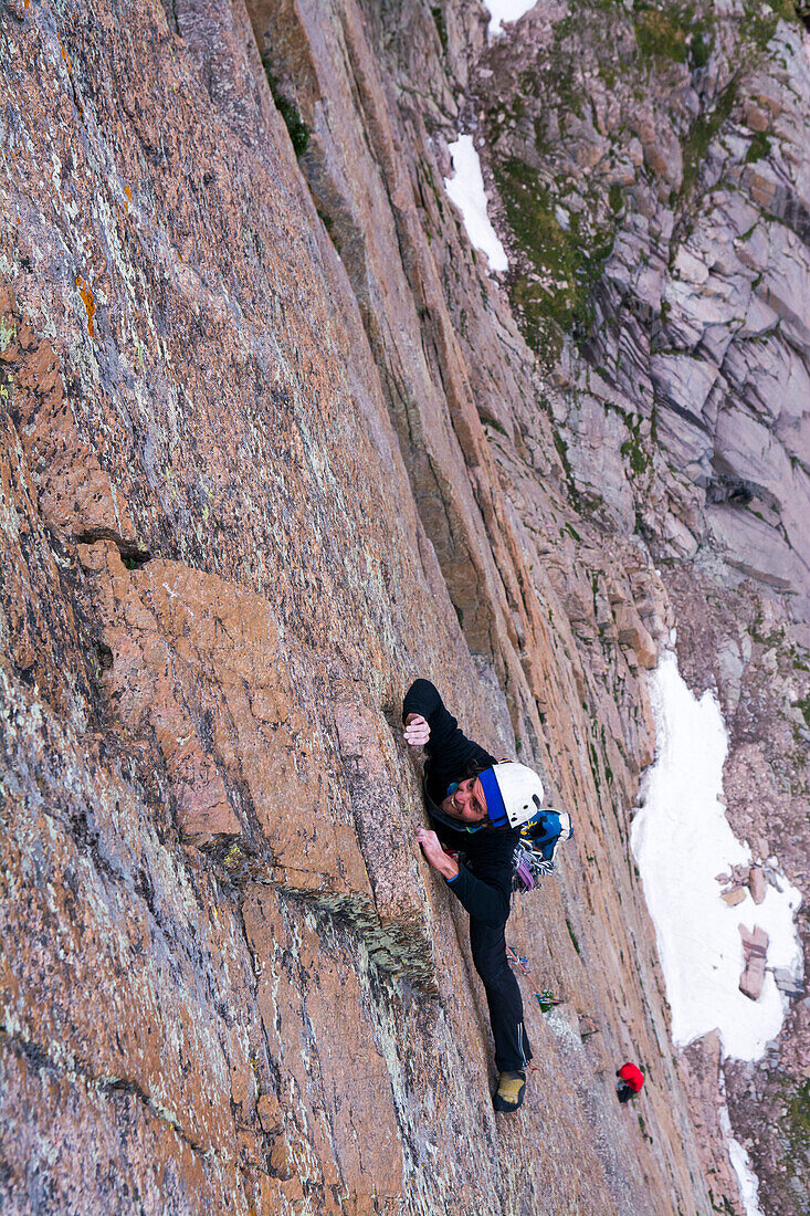 A man rock climbing on the Diamond, Rocky Mountain National Park, Estes Park, Colorado.
