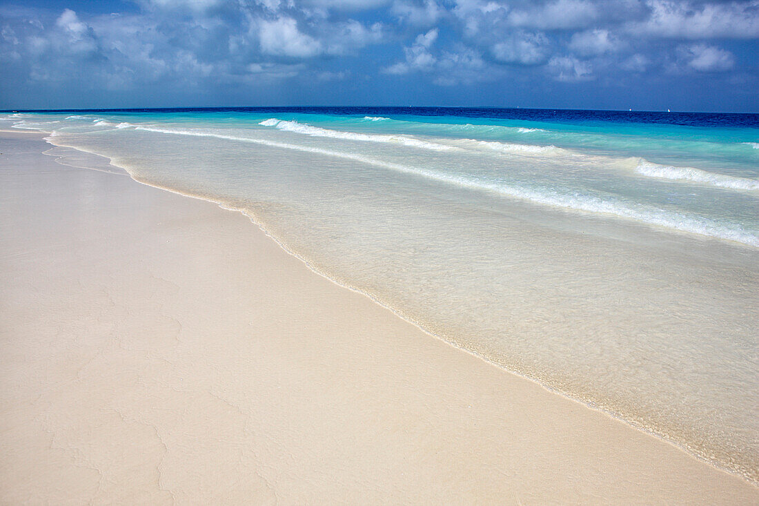 Deserted beach in Nungwi with the blue waters of the Indian Ocean on the background, Nungwi, Zanzibar, Tanzania, East Africa.